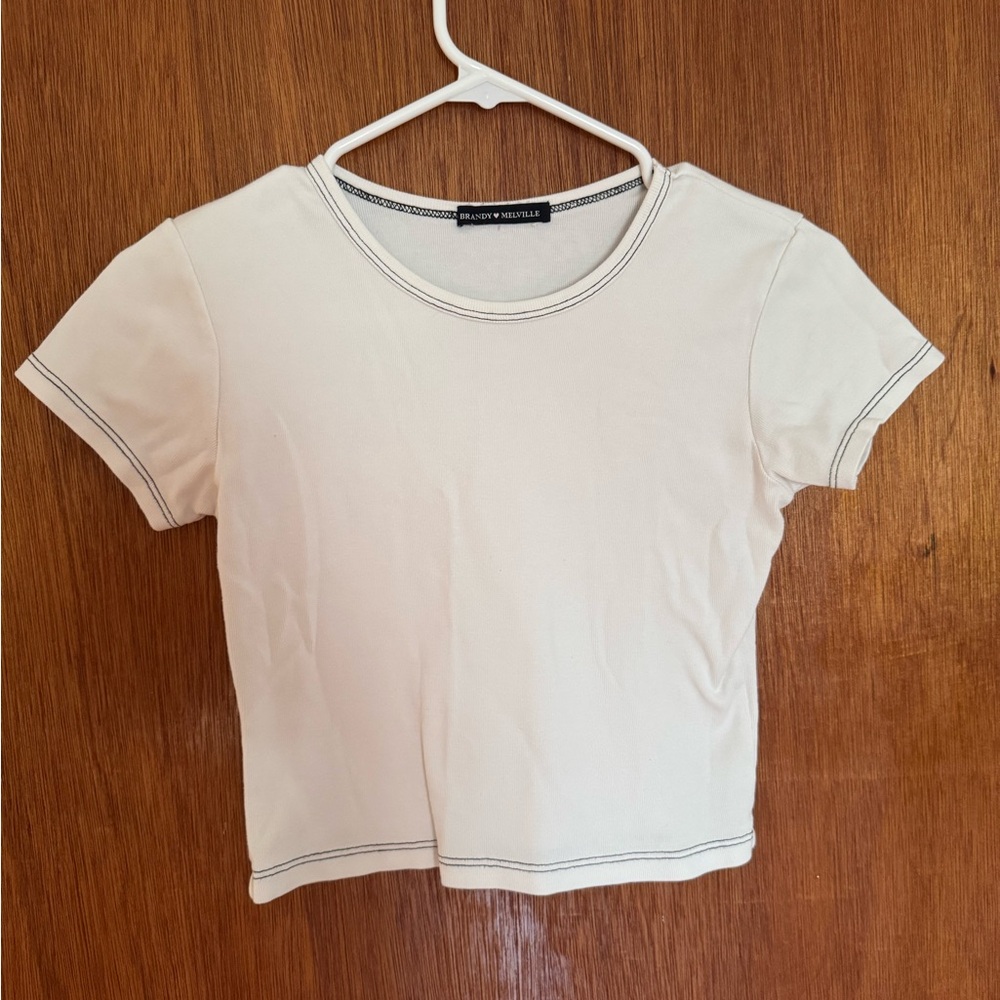 Brandy Melville white crop top with black stitching